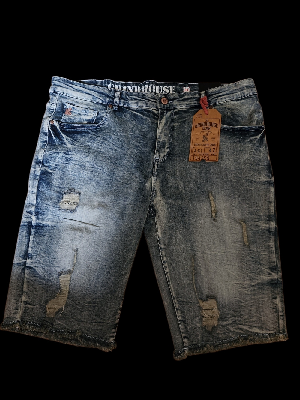 Grindhouse brand denim shorts feature a distressed acid wash Size 44